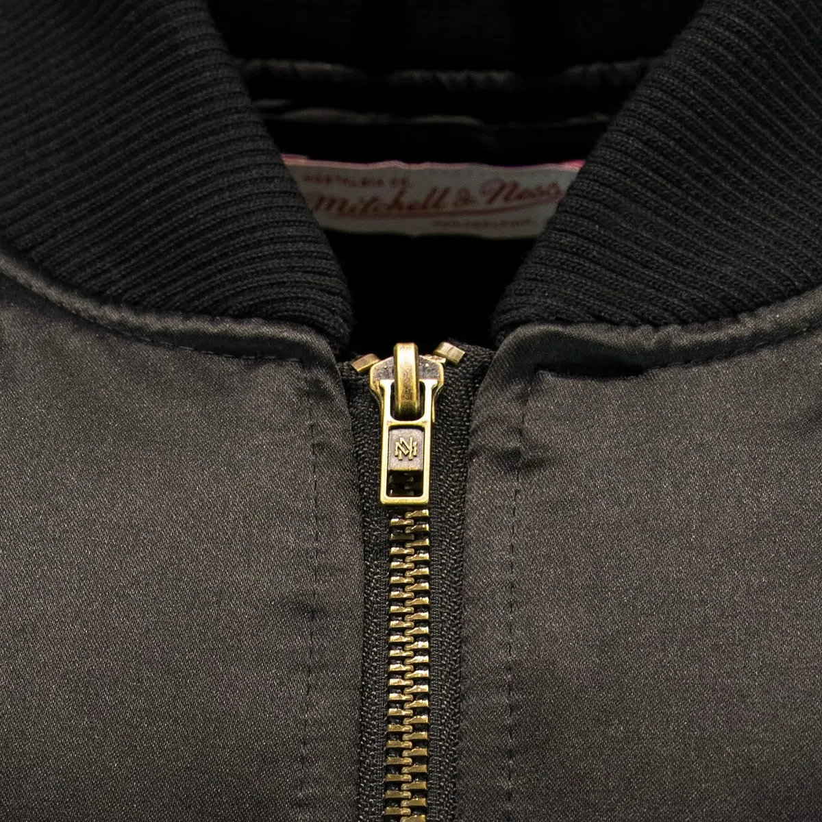 Mitchell & Ness NFL Team Bomber Chaqueta, Negro